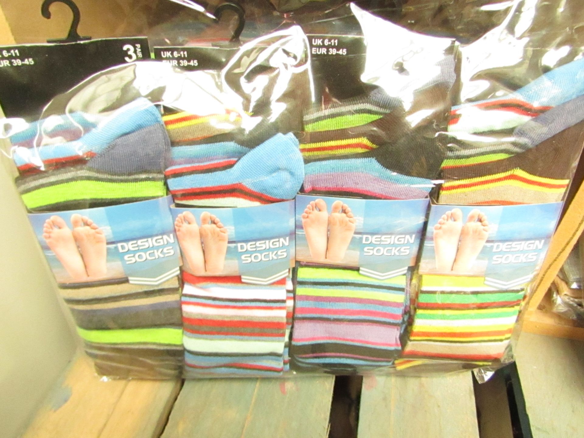 12 X Pairs of Mens Design Socks size 6-11 new in packaging (see image for design)