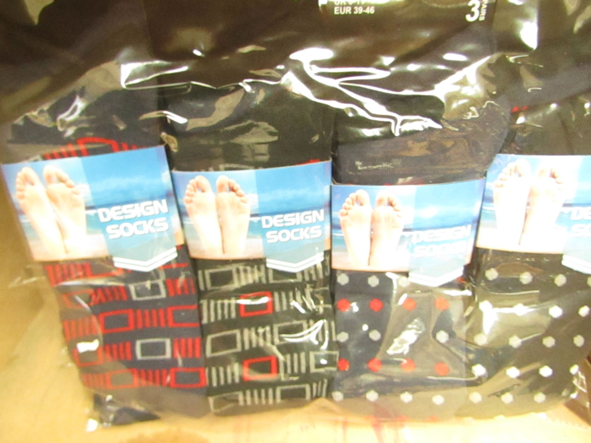 12 X Pairs of Mens Design Socks size 6-11 new in packaging (see image for design)