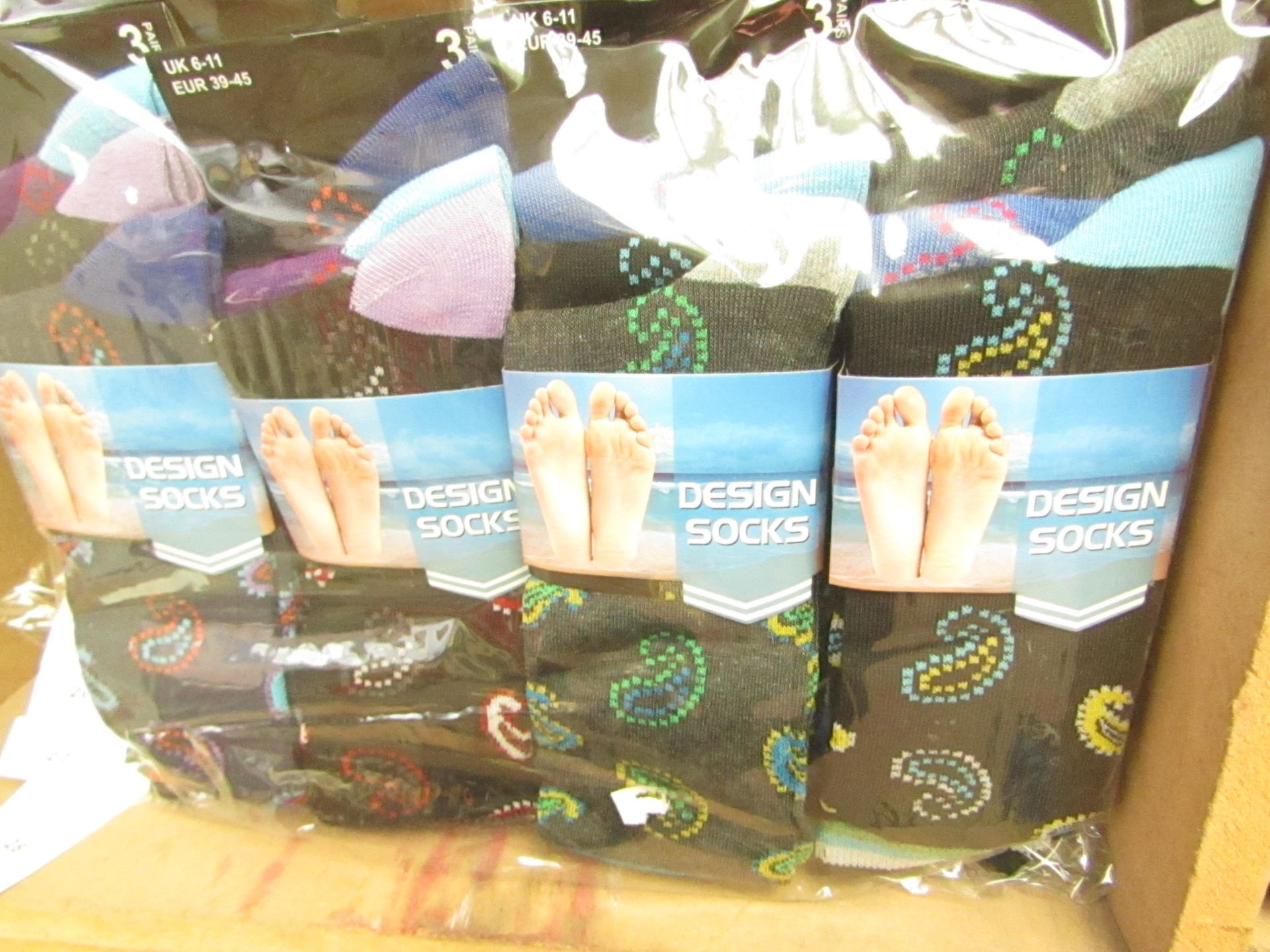 12 X Pairs of Mens Design Socks size 6-11 new in packaging (see image for design)