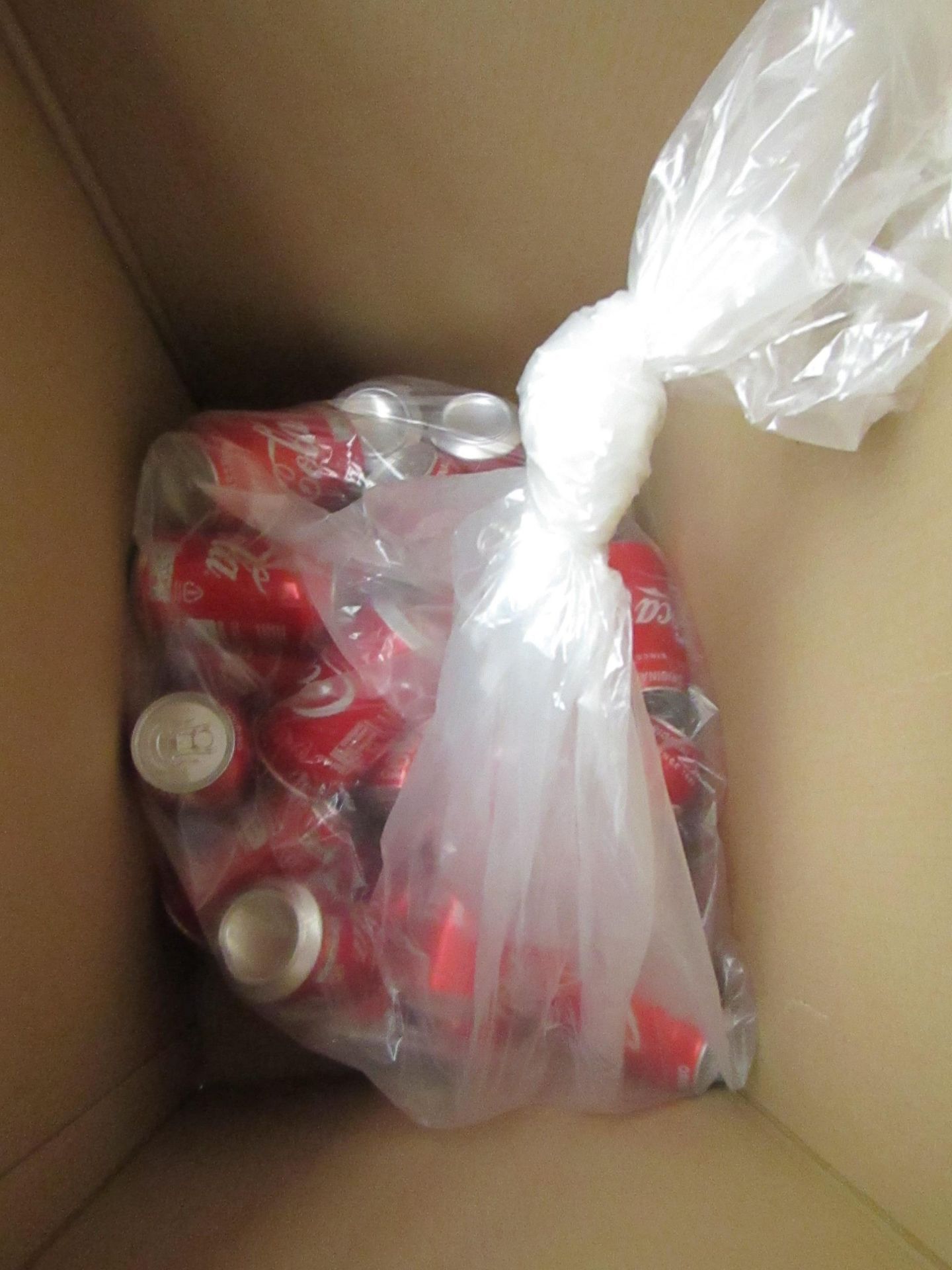 Approx 25x 330ml Coca Cola cans. BB 31/01/2021
