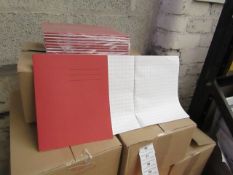 100x Red coloured exercise books, new and boxed.