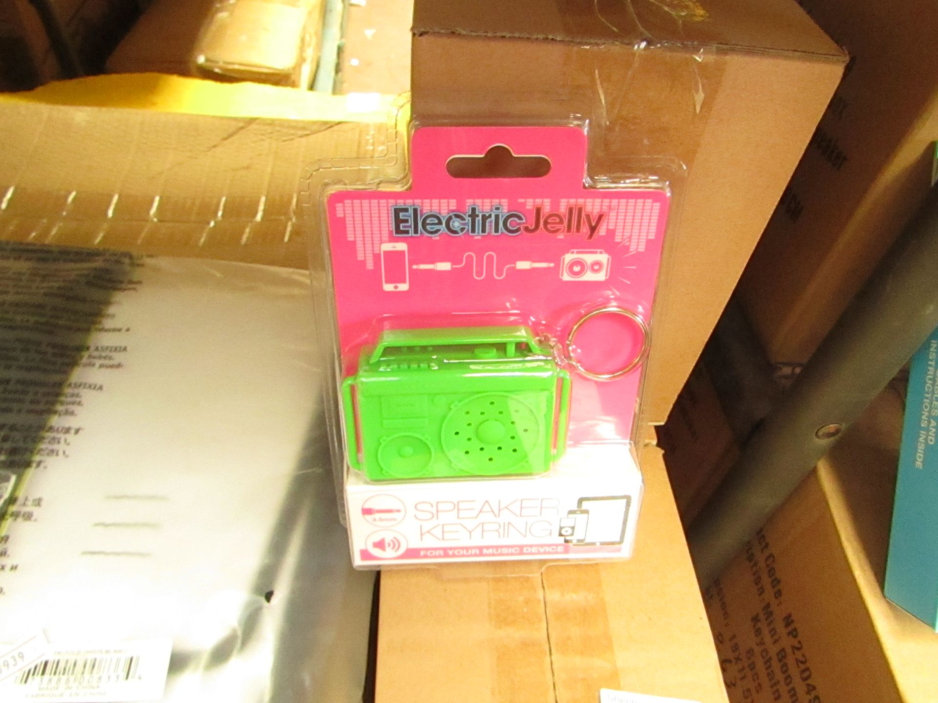 6x Electric Jelly speaker keyring, new and packaged.