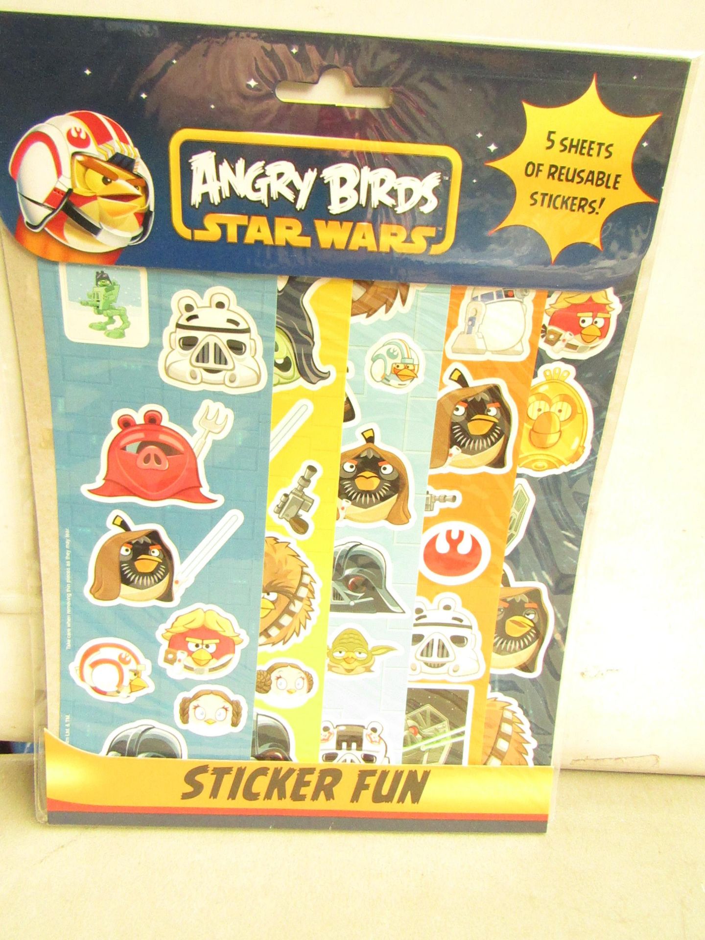 12x Packs of Angry Birds reusable stickers, new and packaged.