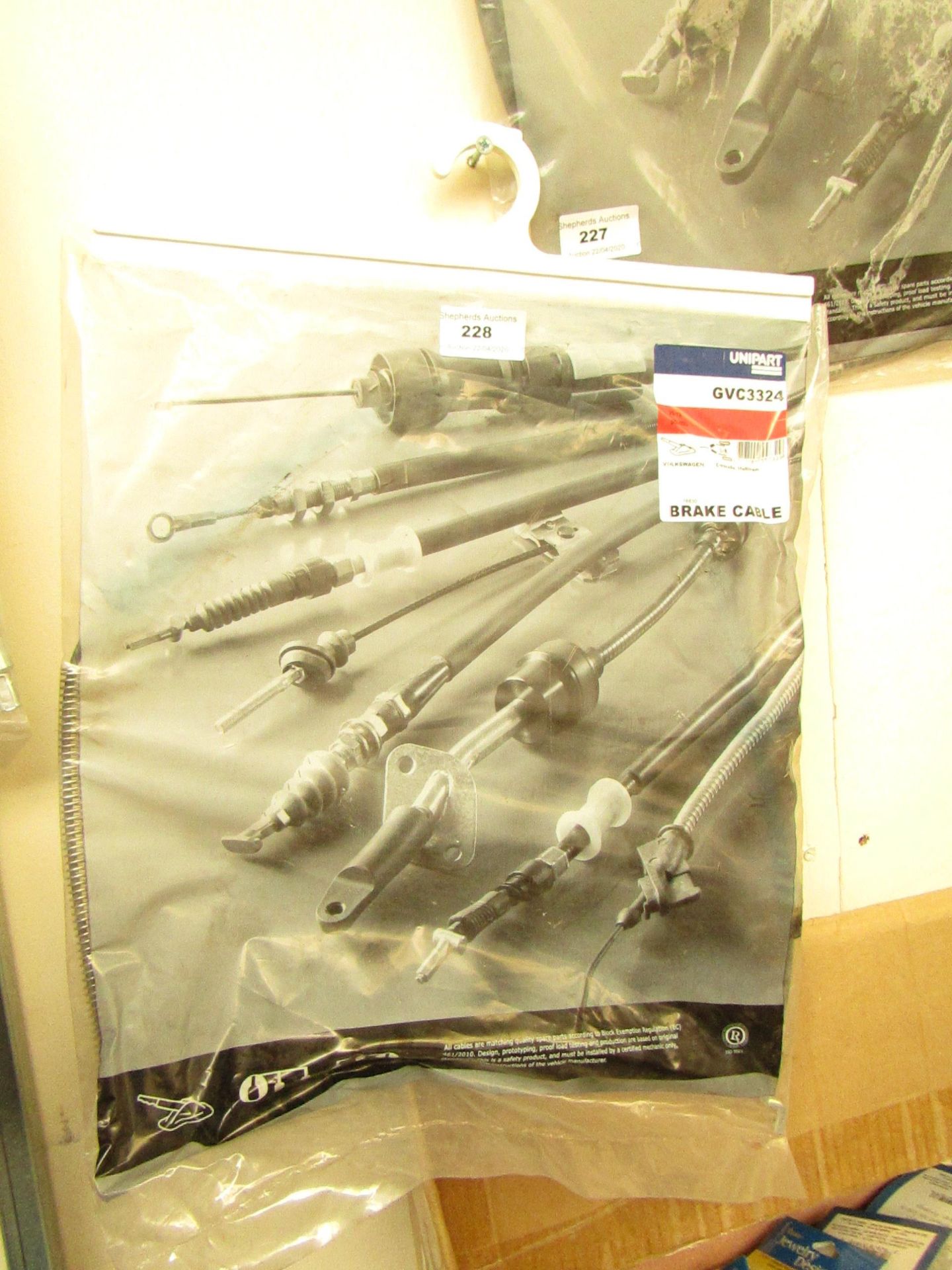 Unipart brake cable, new and packaged.