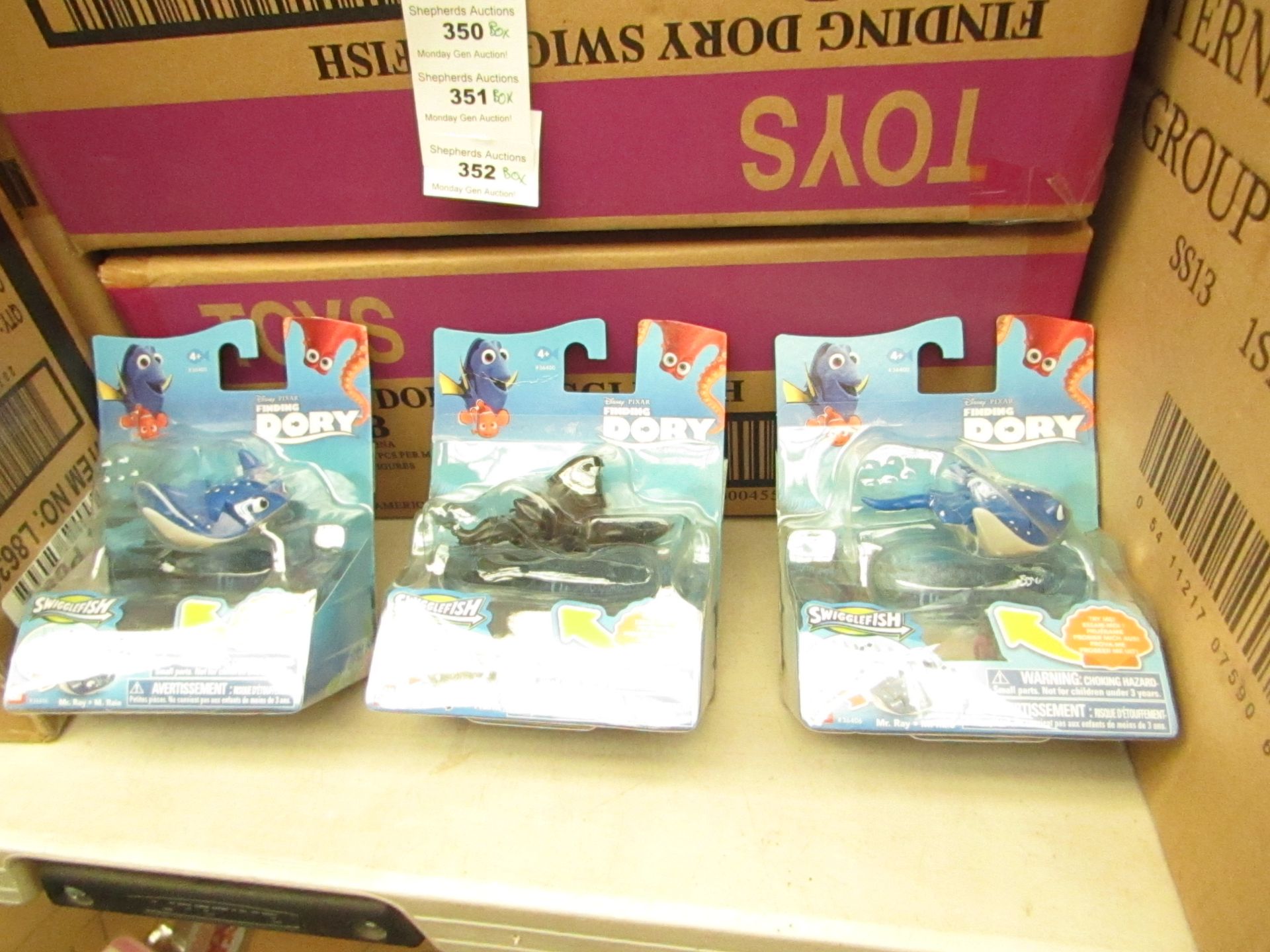 12x Finding Dory swiggle fish, new and packaged.
