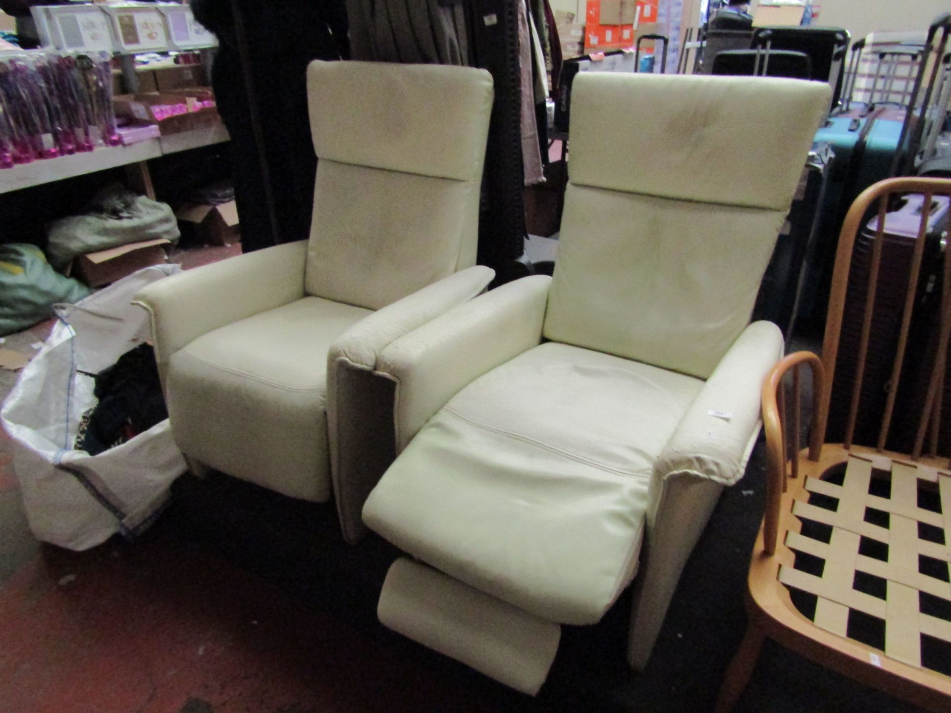 2 x Cream Leather Reclining Chairs. Not the best condition but still usable