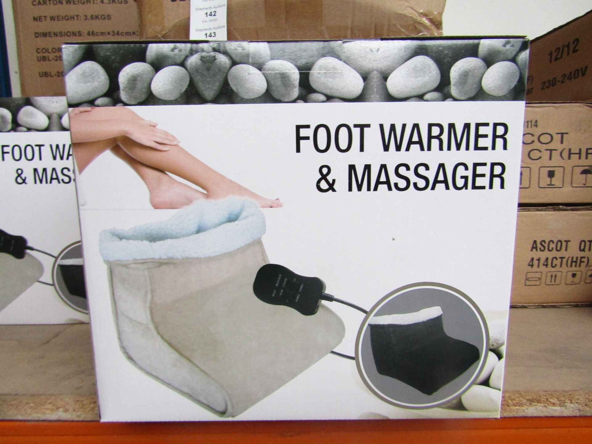 Foot warmer nad massager, new and boxed.