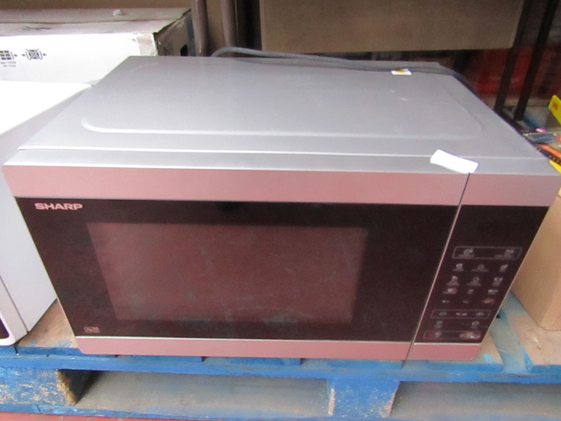 Sharp Digital Microwave oven tested working for heat on a 30 second cycle, not tested any further.