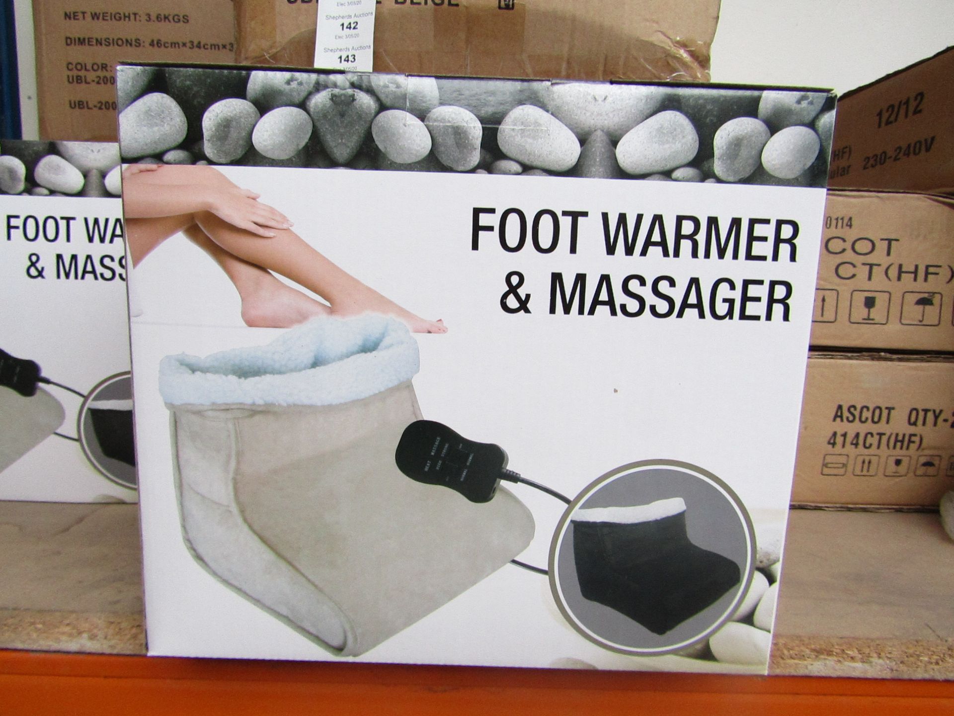 Foot warmer nad massager, new and boxed.