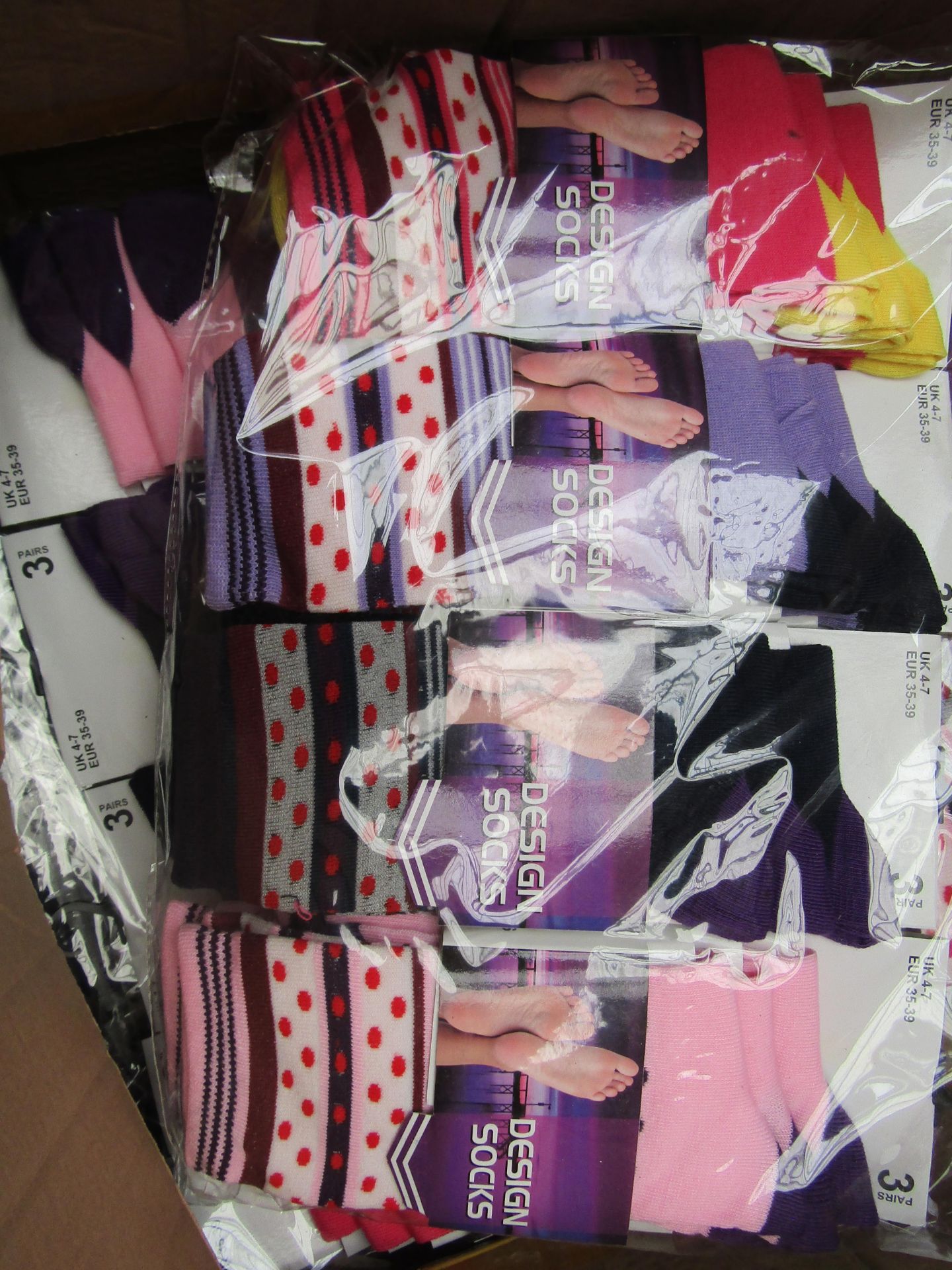 Pack of 12 Ladies Design Socks. Size 4-7. New & packaged