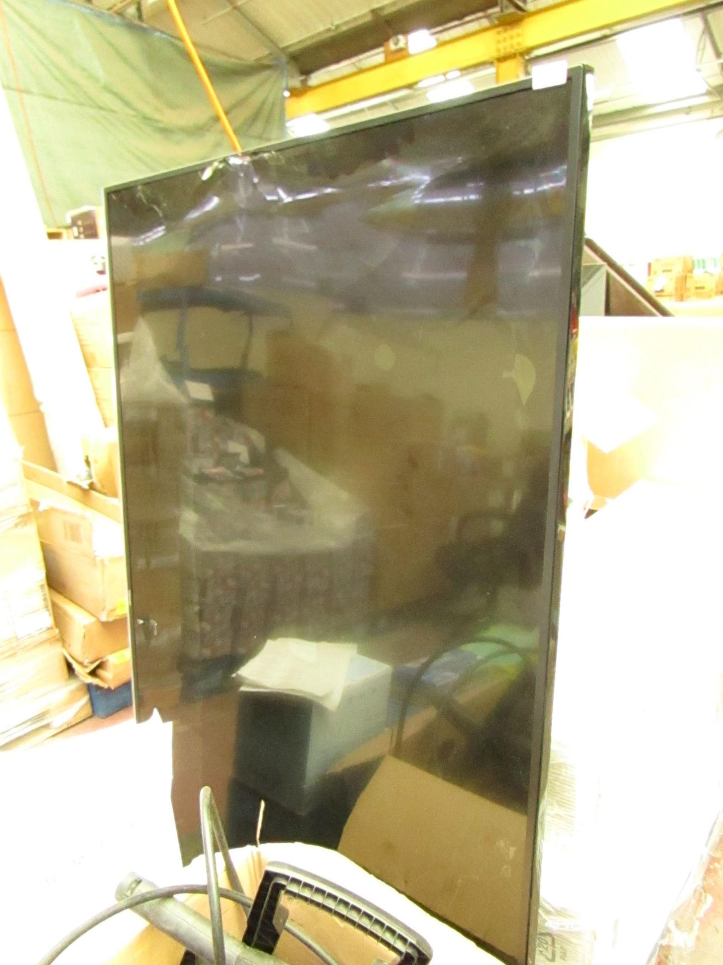 Toshiba 75" smashed screen TV.