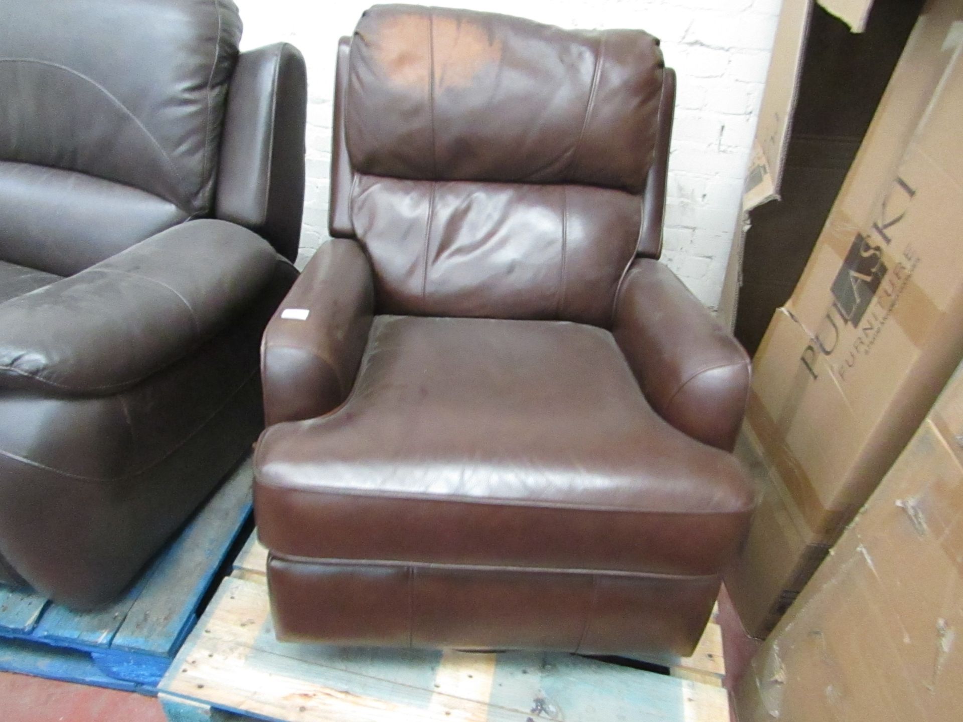 Rocking Swivel manual reclining Arm chair, tested working but has a discoloured patch on the head