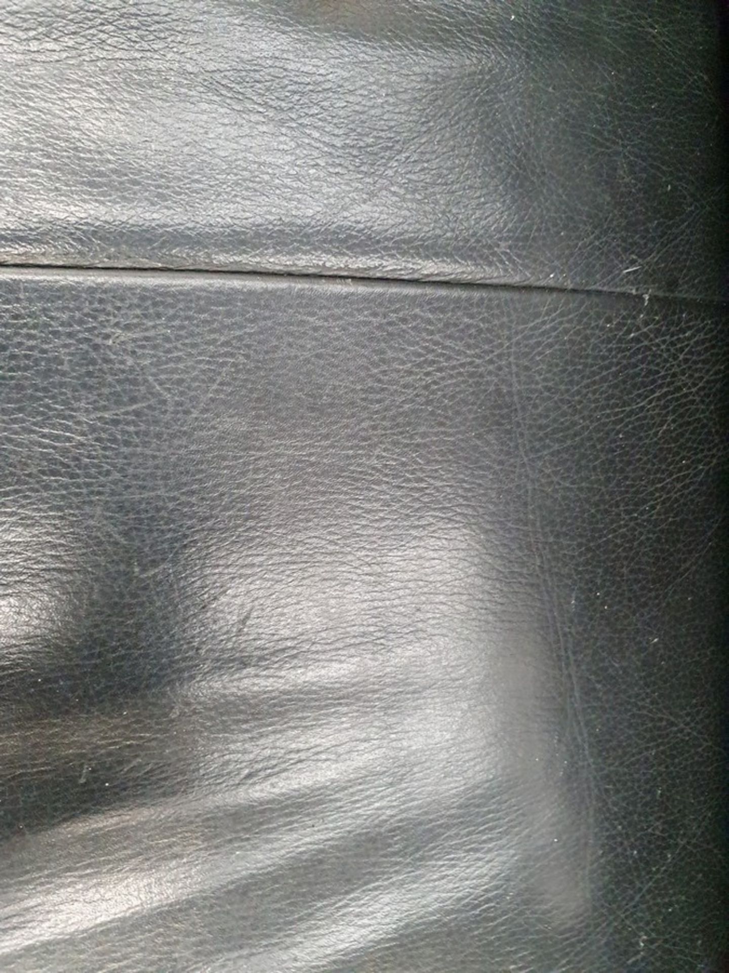 Lounge set of a 3 Seater Black Leather sofa with matching Arm chair, used with a few scratches and - Image 3 of 4