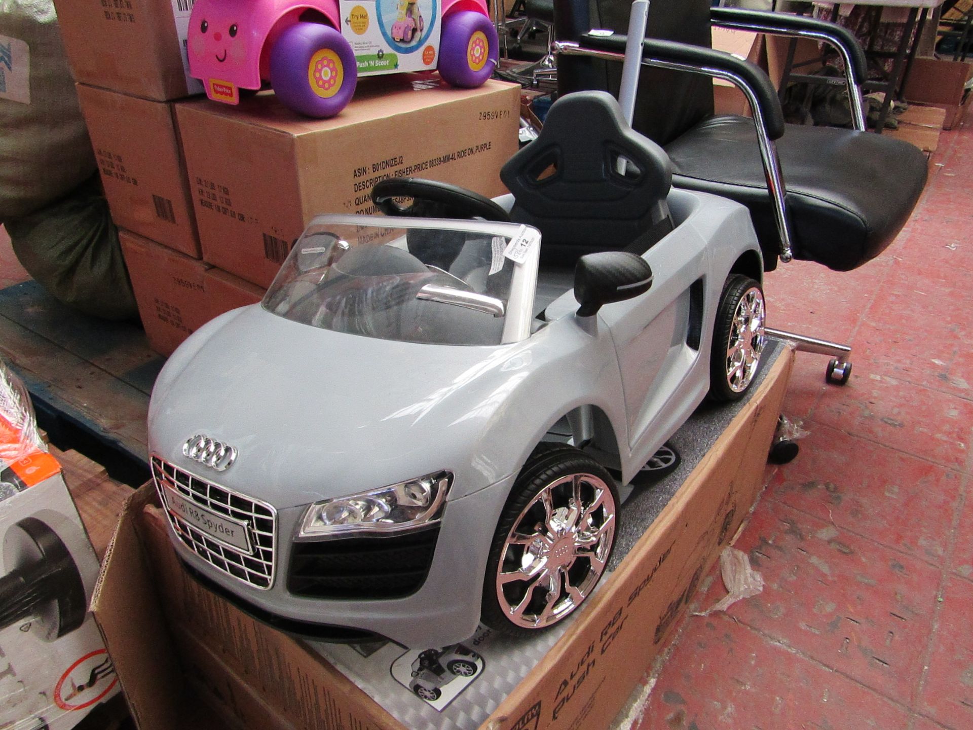 Audi R8 Spyder Push car. Brand New & Boxed But The Push Handle Doesn’t stay all the way up. Still