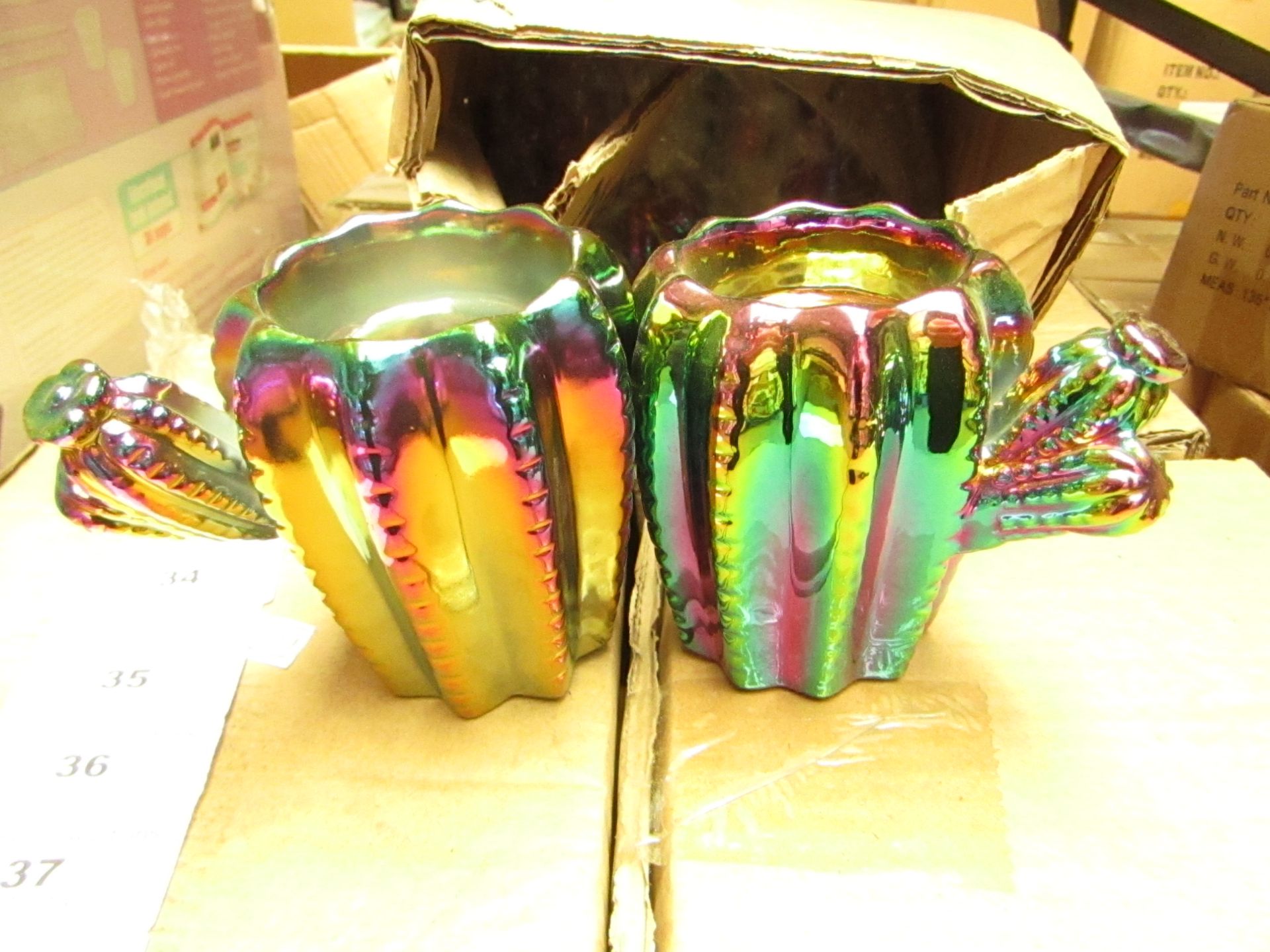 4 Boxes of 4 Oil Slick Cactus Tealight Holders. New & Boxed