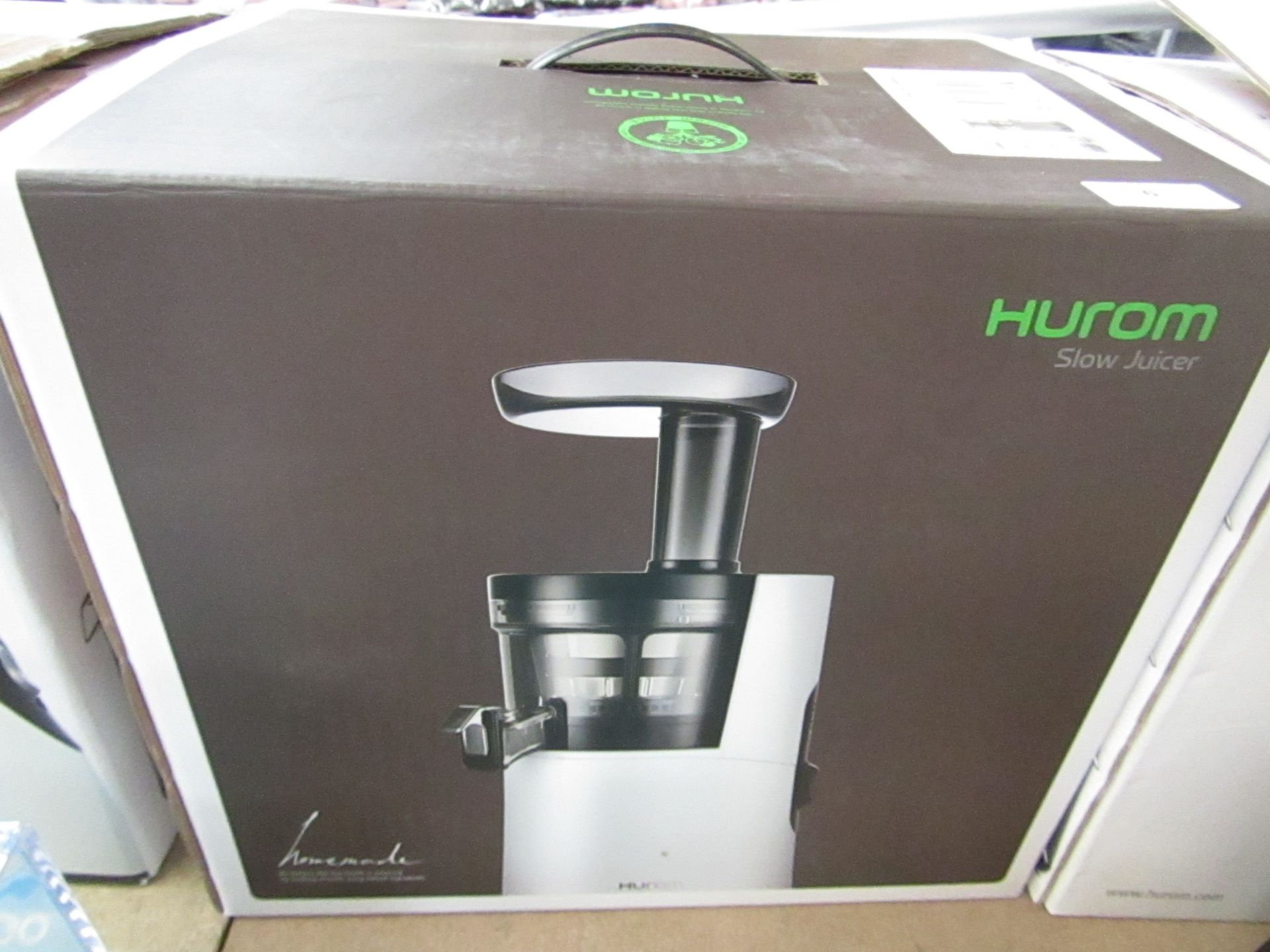 Hurom slow juicer, unchecked but is used, boxed