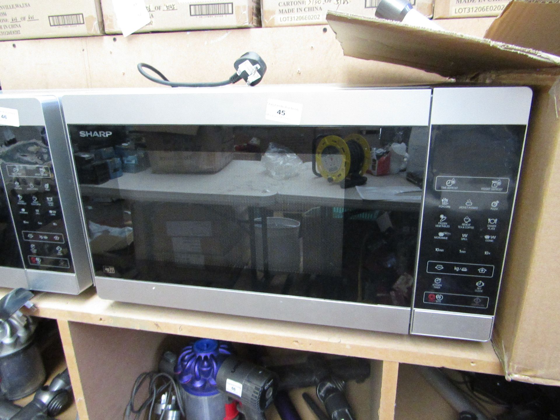 Sharp YC-MG81U-S Microwave and grill, tested working on the microwave function as in we heated a