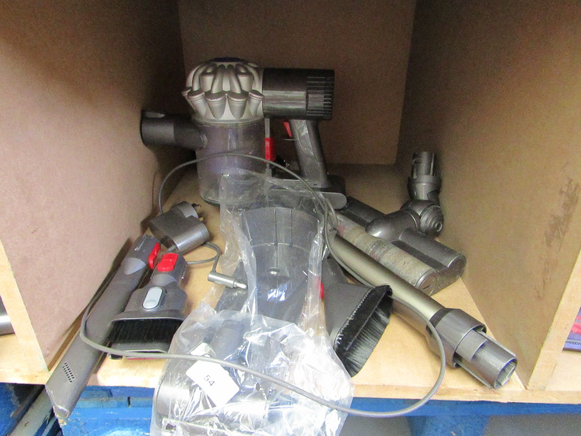 Dyson V6 hand held cordless vacuum, used, tested working after being on charge for a short time,