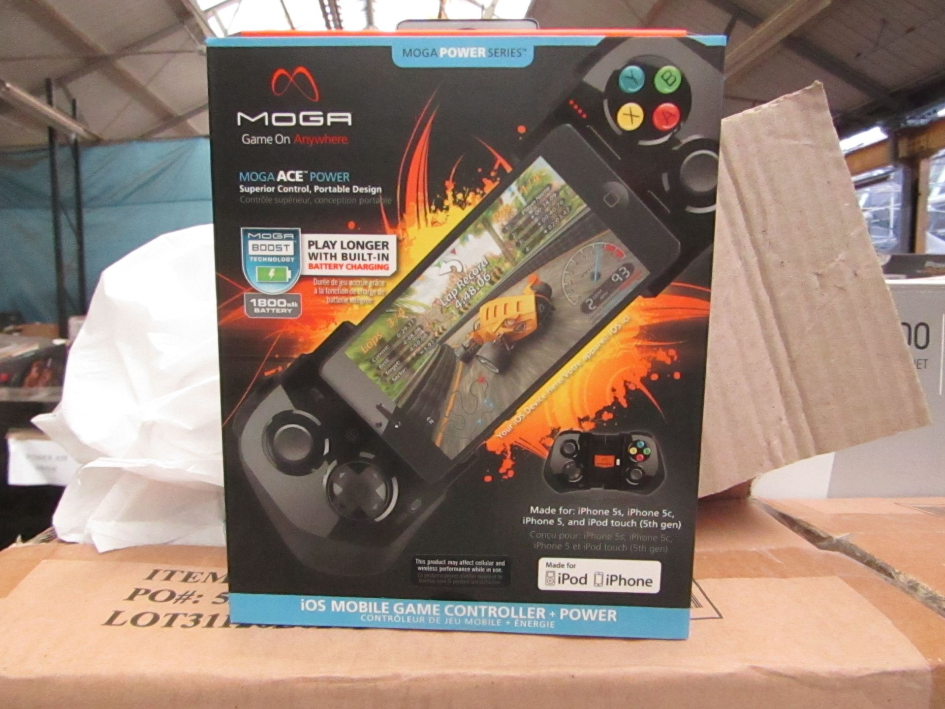 Moga iPhone mobile gaming controller attaachment that also charges the phones, it turns the phone