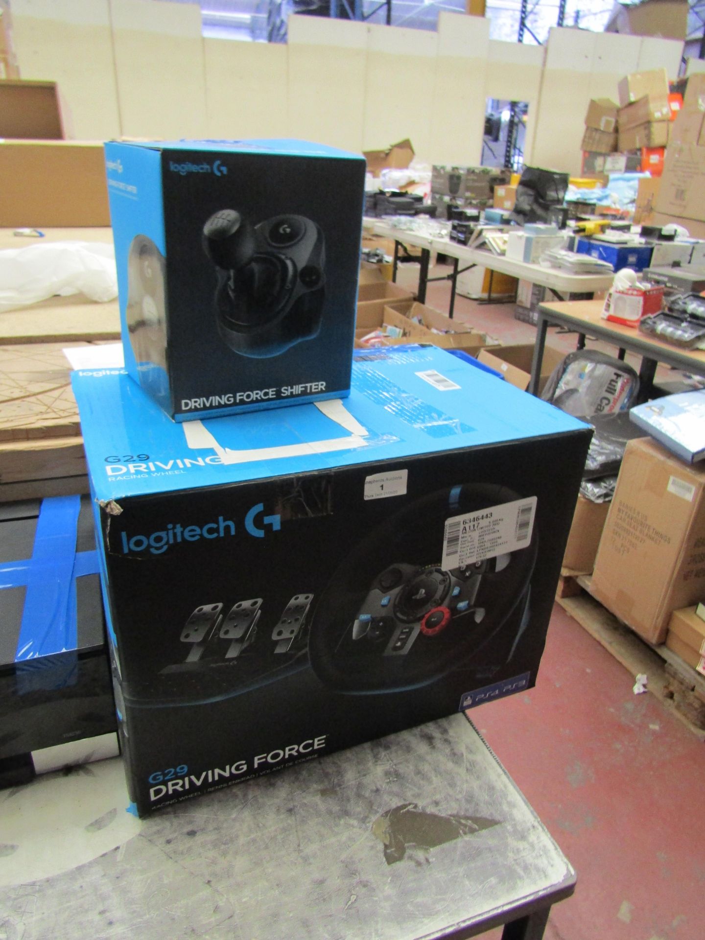 Logitech G29 driving force racing steering wheel and pedals with a Logitech driving force shifter,