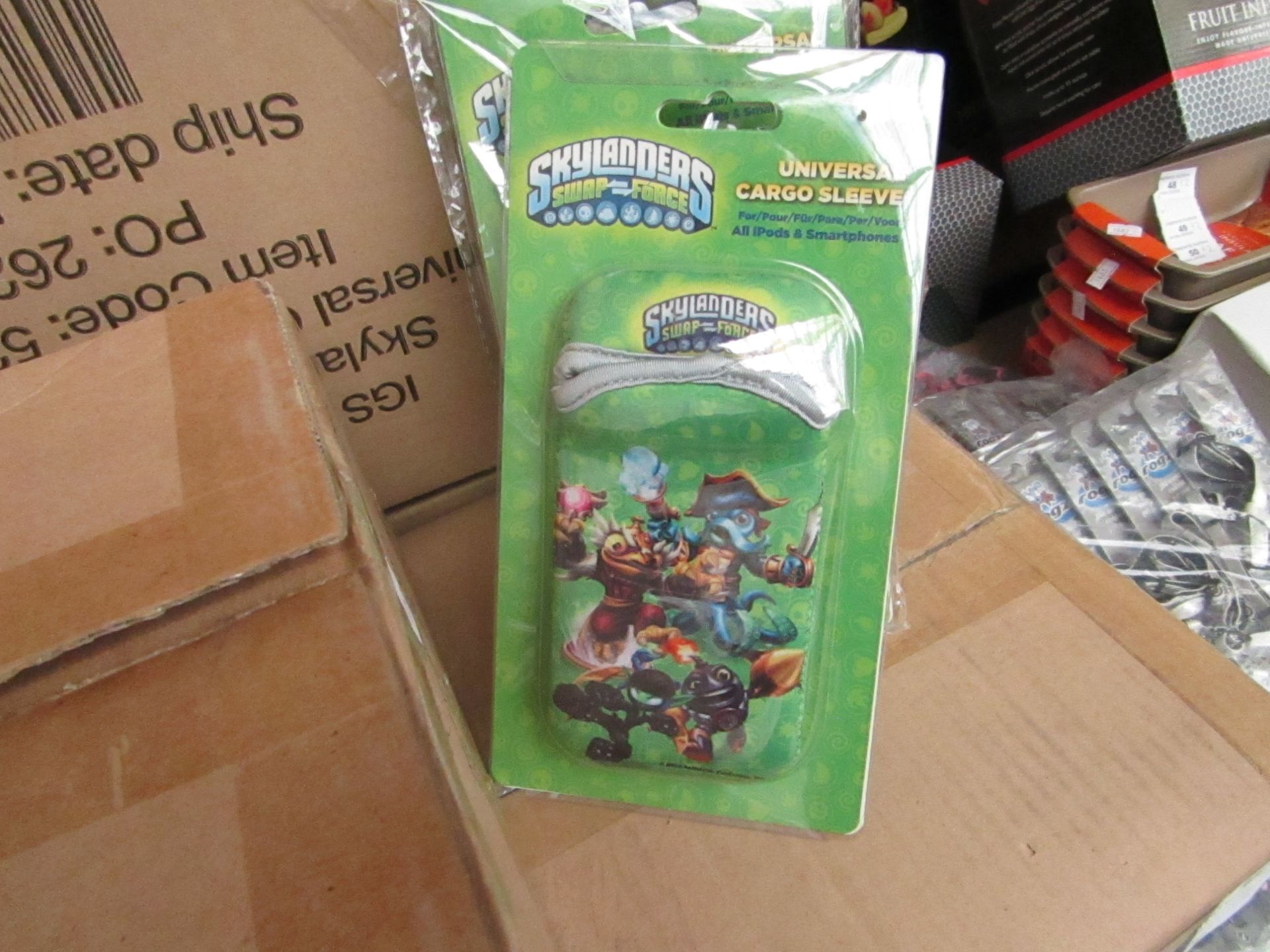 Box of 12 Skylander Swap Force Universal Cargo Sleeve For Ipods & Smartphones. Packaged