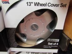 Set of 4 13" Wheel Covers. New & Boxed