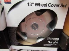 Set of 4 13" Wheel Covers. New & Boxed