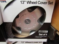 Set of 4 13" Wheel Covers. New & Boxed