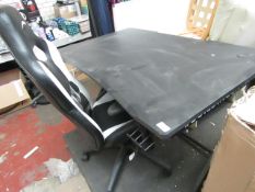 Trust PC Desk with Gaming Chair. The Desk is damaged on the corner & The Gas piston doesn’t go up on