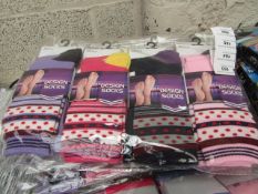 Pack of 12 Ladies Design Socks. Size 4 - 7. New & packaged