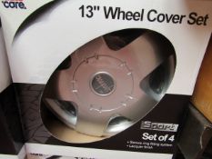 Set of 4 13" Wheel Covers. New & Boxed