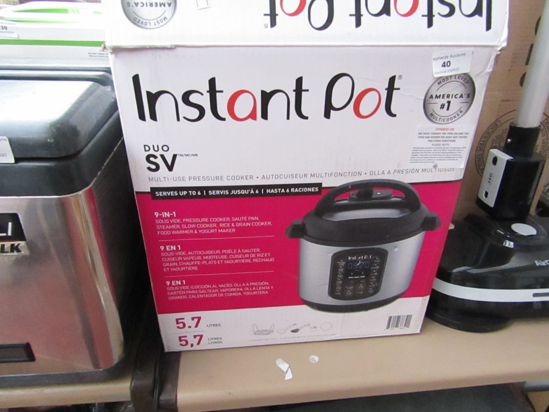 Instant Pot 9 in 1 5.7L multi-use pressure cooker, powers on but not tested full functions and