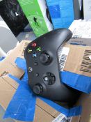 XBOX One black controller, powers on but not fully tested functions. Comes in non original box.