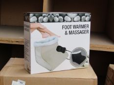 Foot warmer and massager, new and boxed.