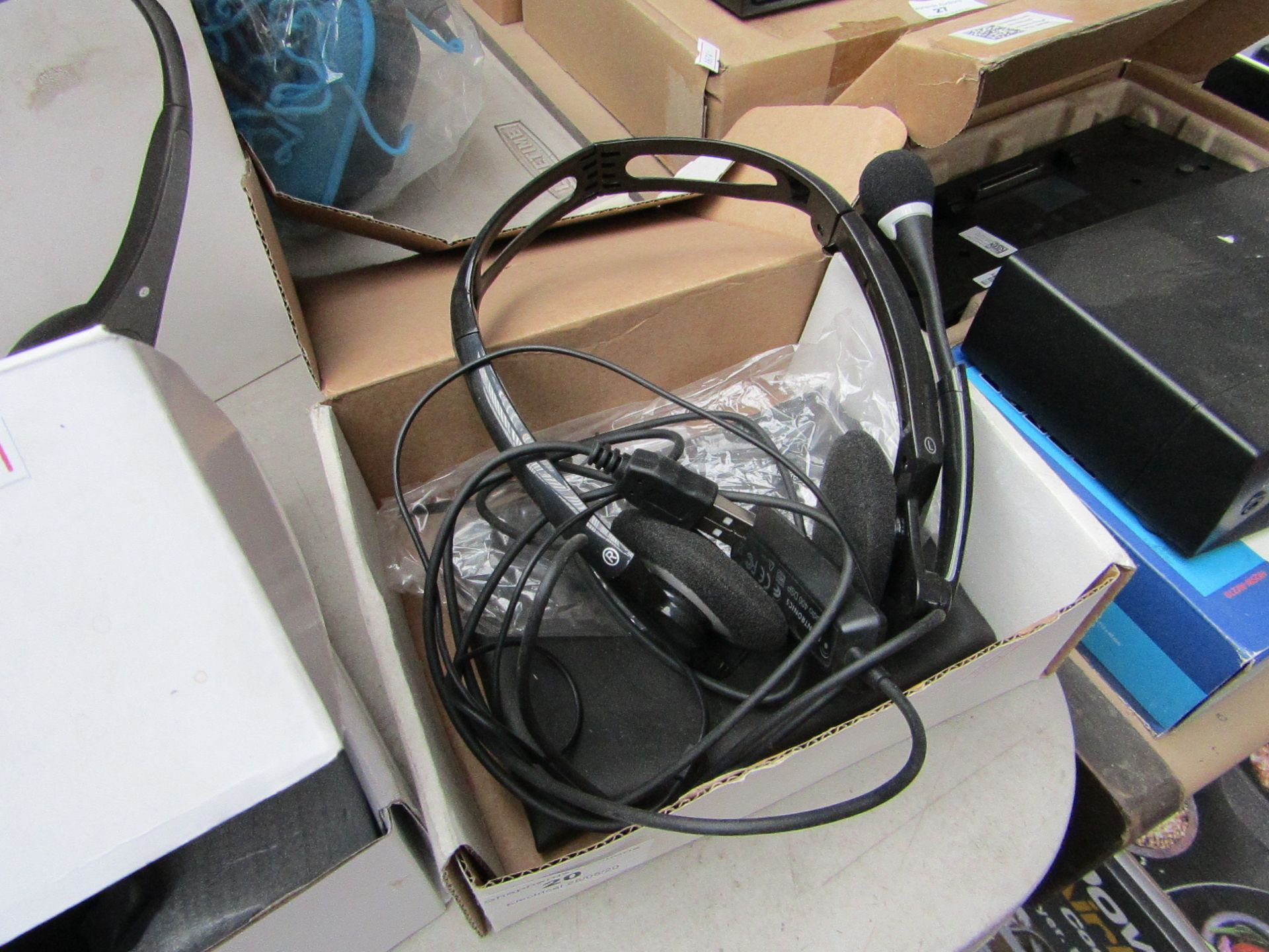 Plantronics office headset, untested and boxed.