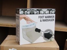 Foot warmer and massager, new and boxed.