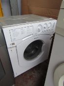 Hotpoint integrated 7Kg washing machine, powers on and spins but has a loose drum.