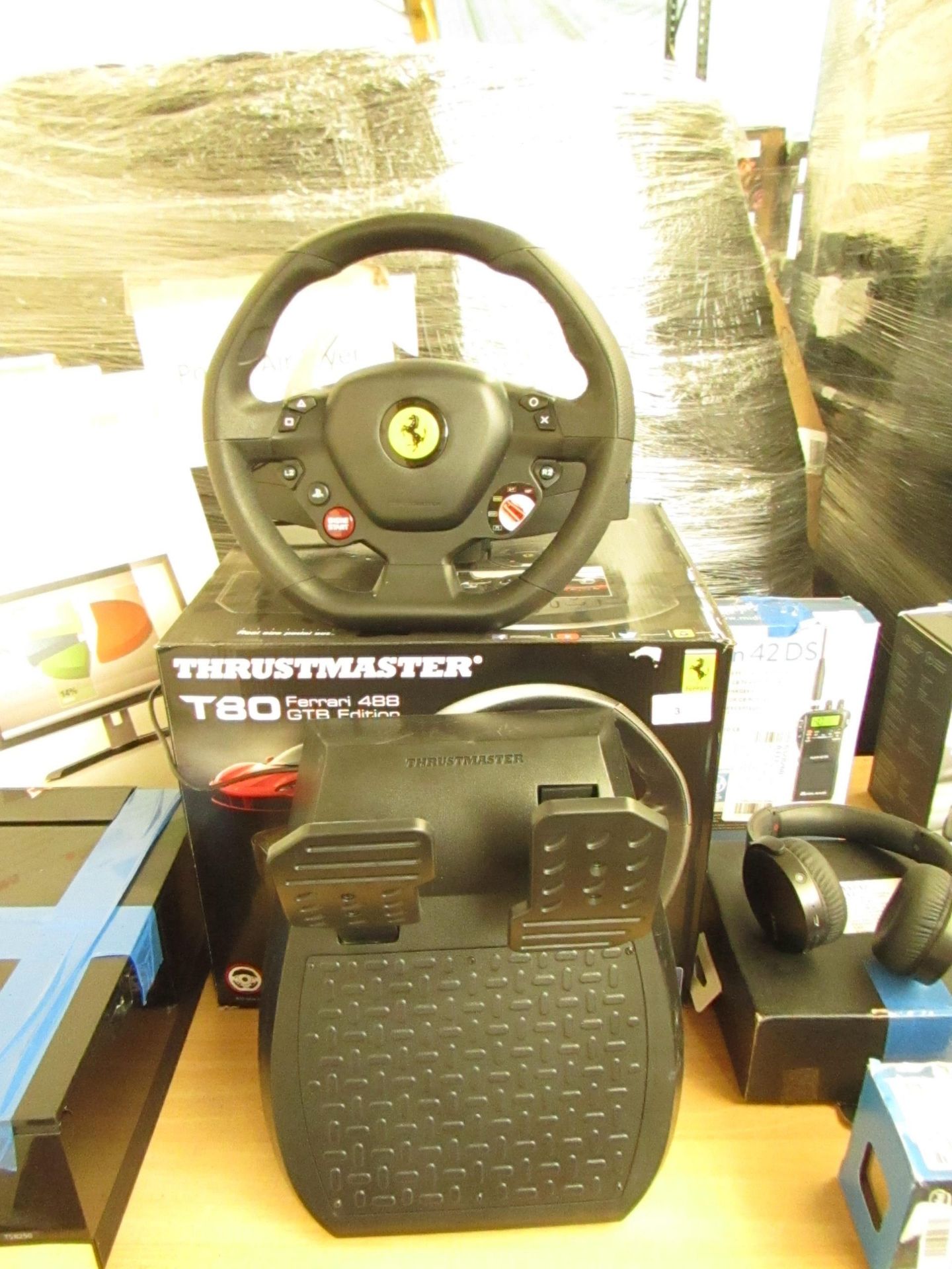 Thrustmaster T80 racing wheel and pedals, untested and boxed. RRP œ98.98