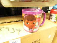 24x Doc McStuffins children's plastics mugs, new and boxed.