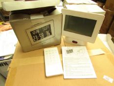 2 x Alarm Clocks With remotes. Unused & Boxed