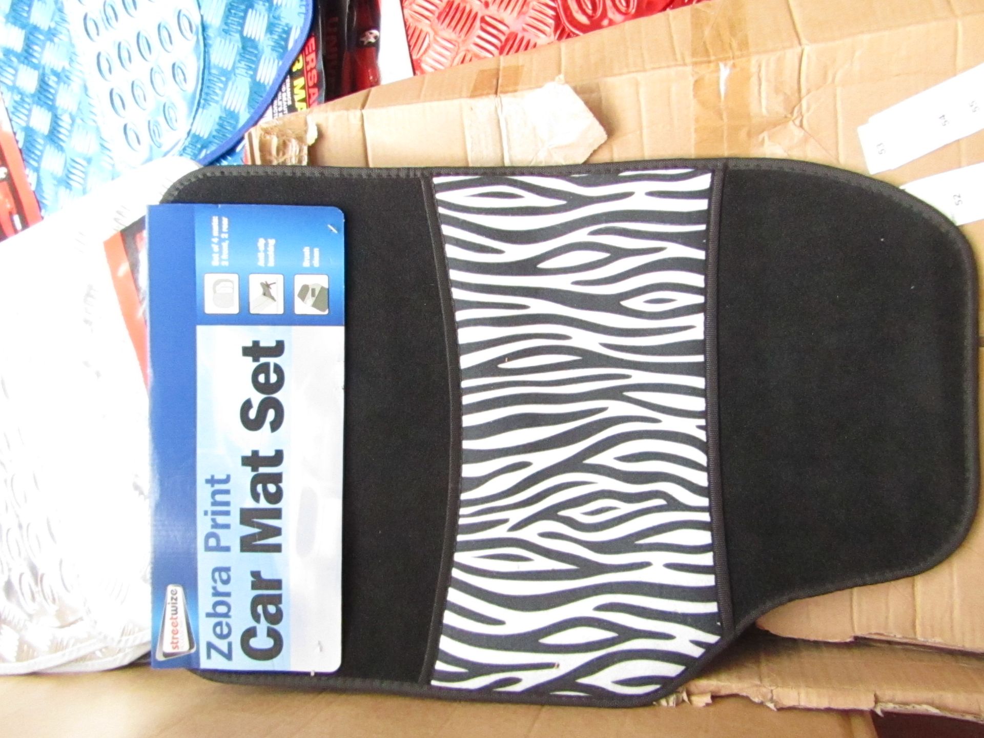 Set of 4 Zebra print effect universal car mats, new