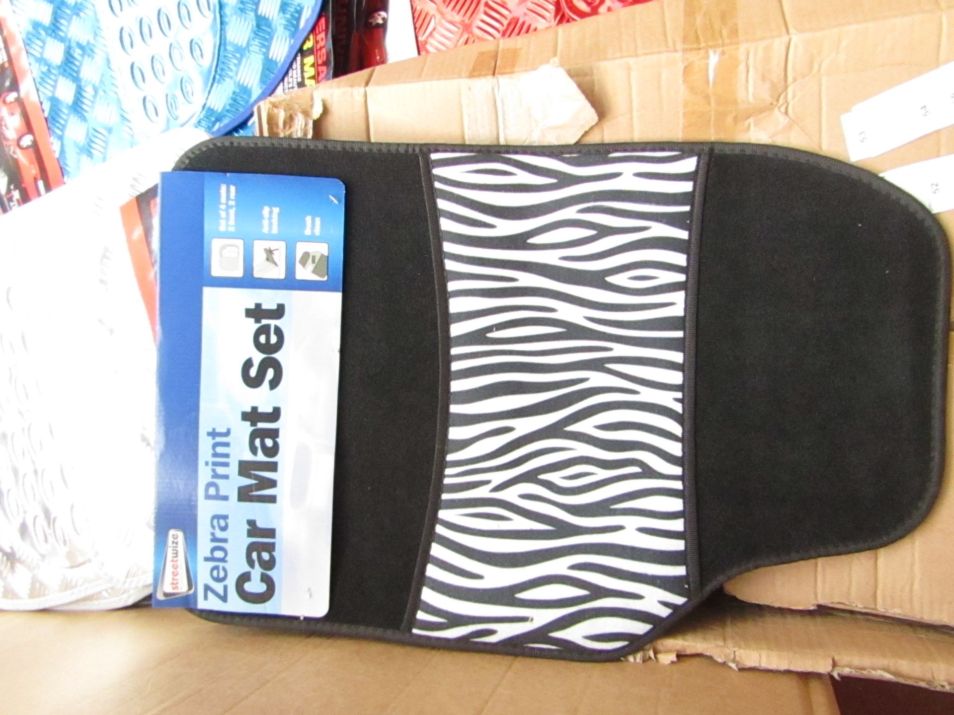 Set of 4 Zebra print effect universal car mats, new