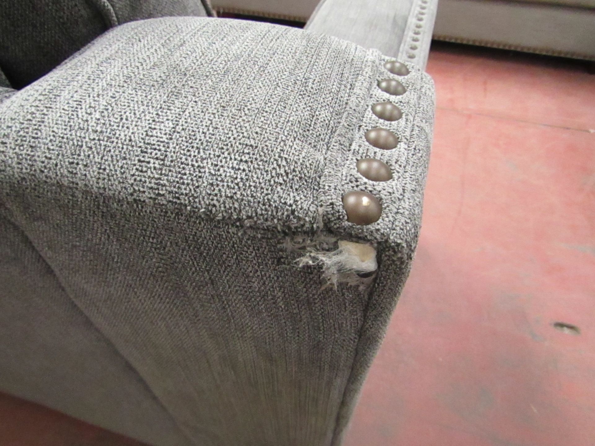 Grey fabric costco corner sofa with button detail, looks in good condition, just has a nick on the - Image 2 of 2