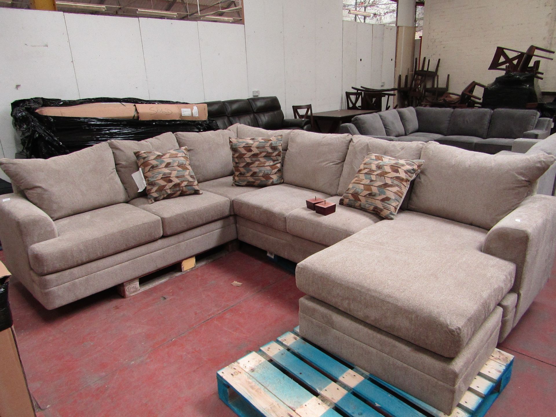 Beige Costco corner sofa with chaise built on, in good condition but has a couple of dirt marks