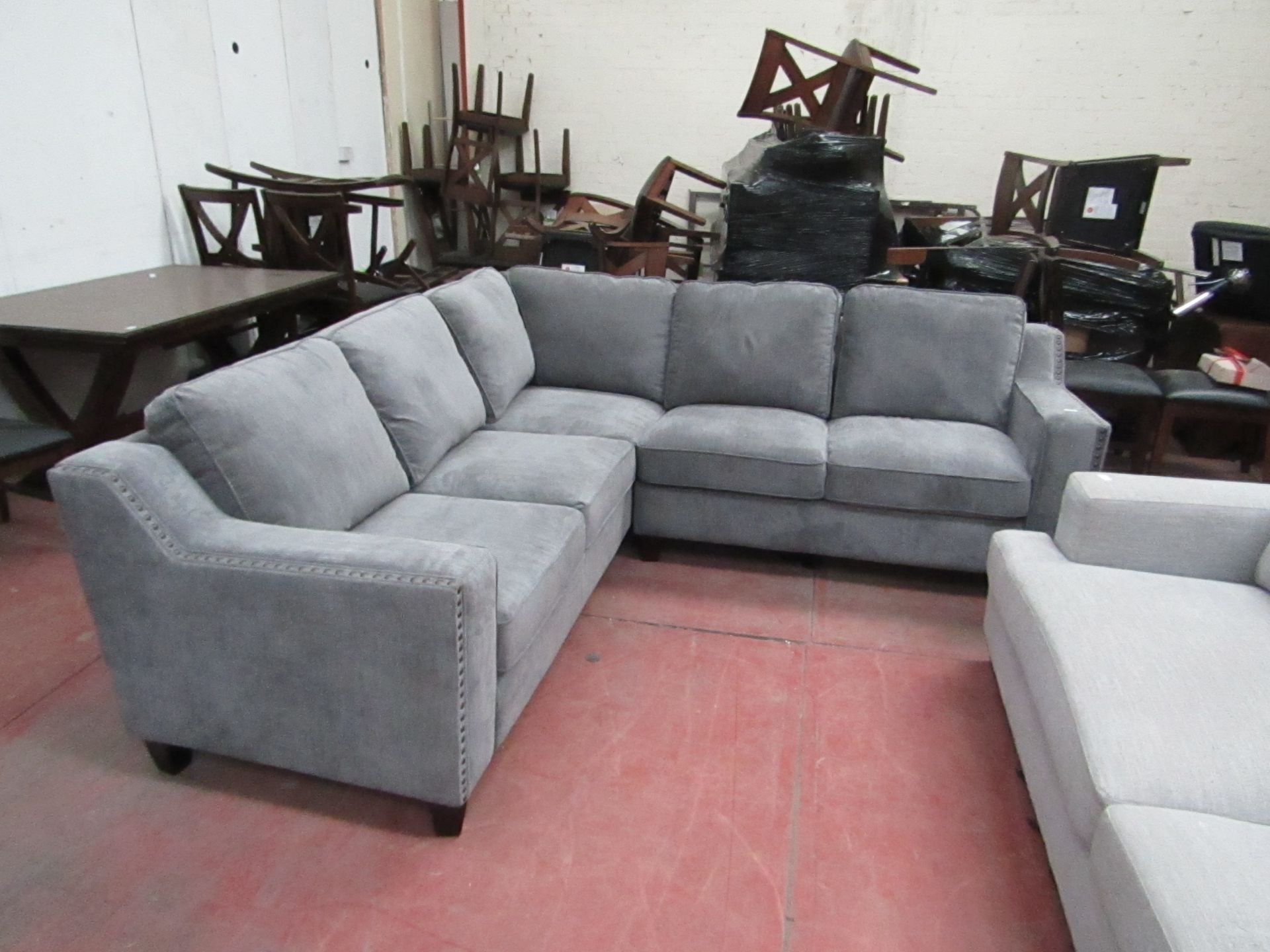 Grey fabric costco corner sofa with button detail, looks in good condition, just has a nick on the