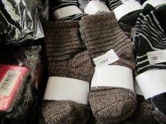 20 pairs of Kids Socks. Unsre of Size but id Say More for a Baby/Toddler. Unused