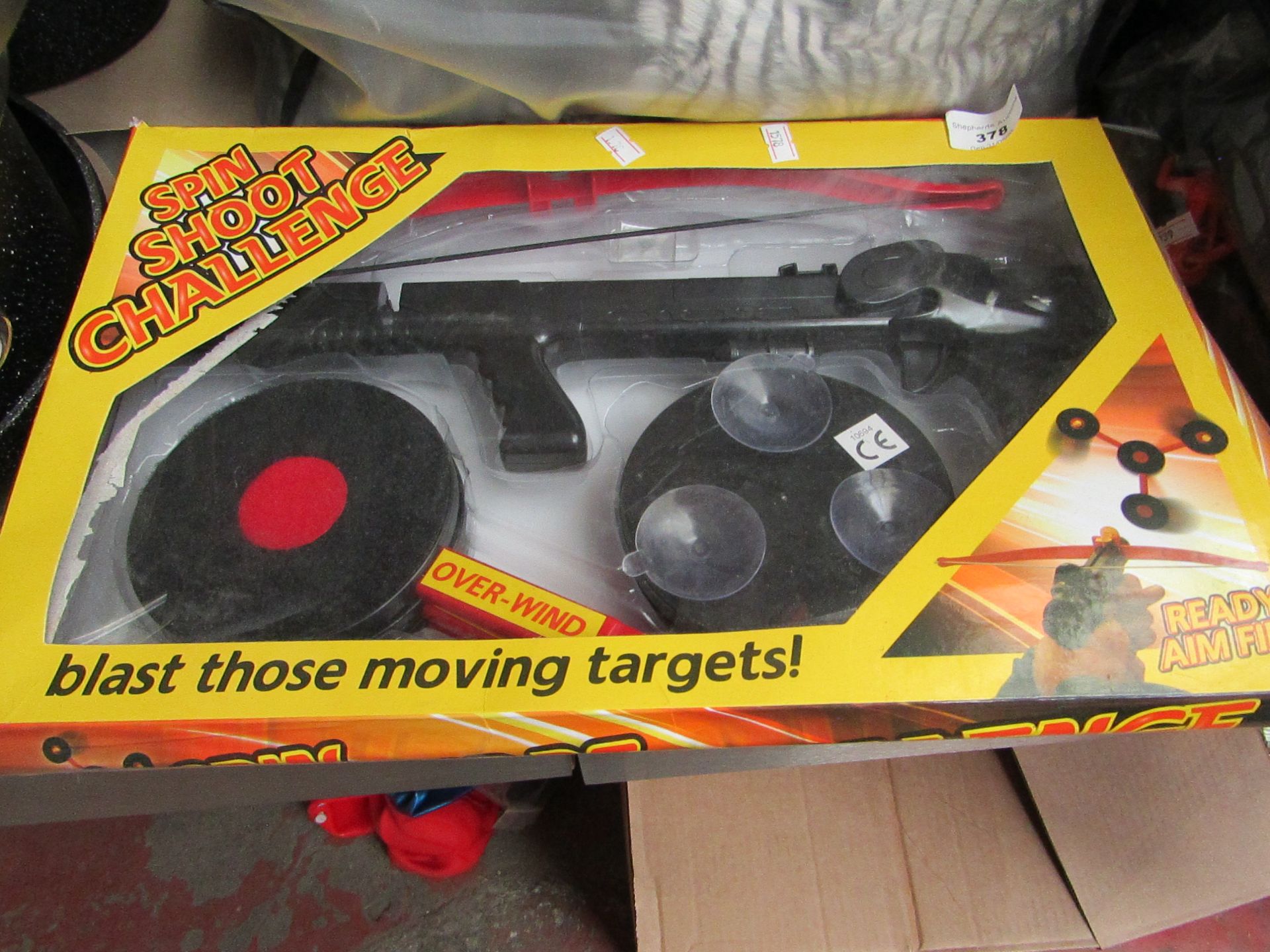 Spin Shoot Challenge Toy. Looks unused but packaging is slightly damaged