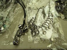 7 x Necklaces. See Image for design. Unused & Packaged