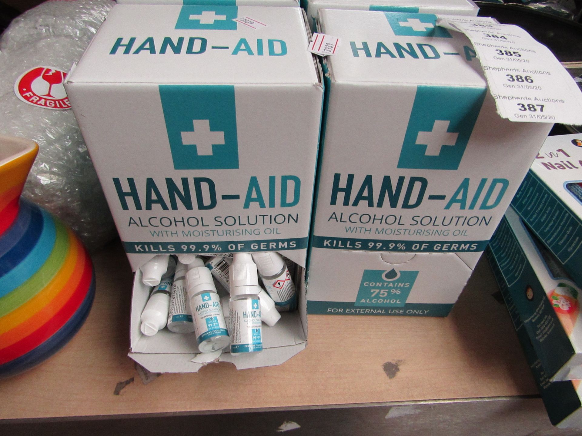 Box of 50 x 10ml Hand Aid Alcohol Solutions with moisturising Oil. Unused & Boxed