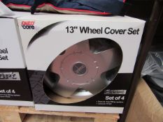 Set of 4 13" Auto Care Wheel Covers. Boxed